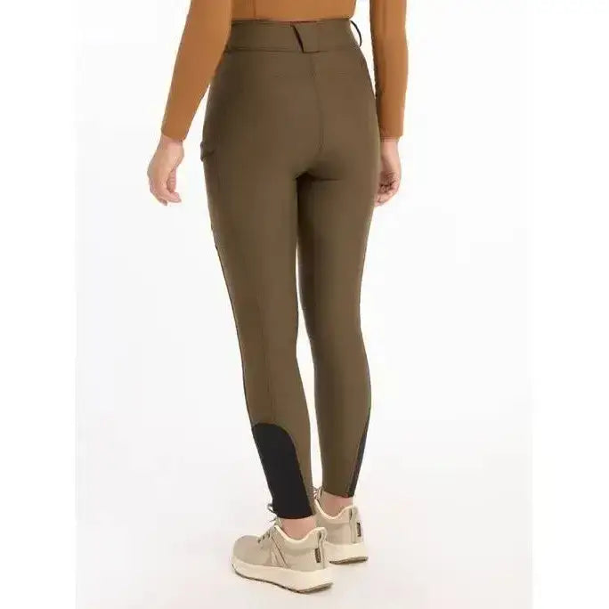 Olive green lemieux drytex waterproof breeches with black knee grip alpine panels and high waistband for riding