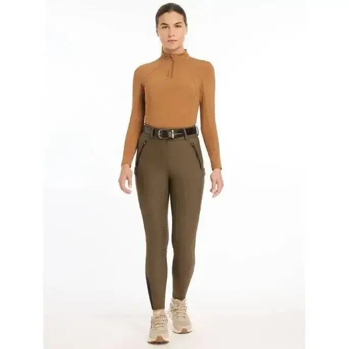 Olive green lemieux drytex waterproof breeches knee grip alpine with black zipper accents and fitted design
