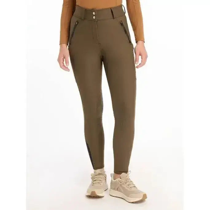 Olive green lemieux drytex waterproof breeches with black zippers and button closure knee grip alpine style