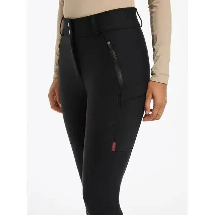 Black lemieux drytex waterproof breeches knee grip with sleek design and subtle side pocket zippers
