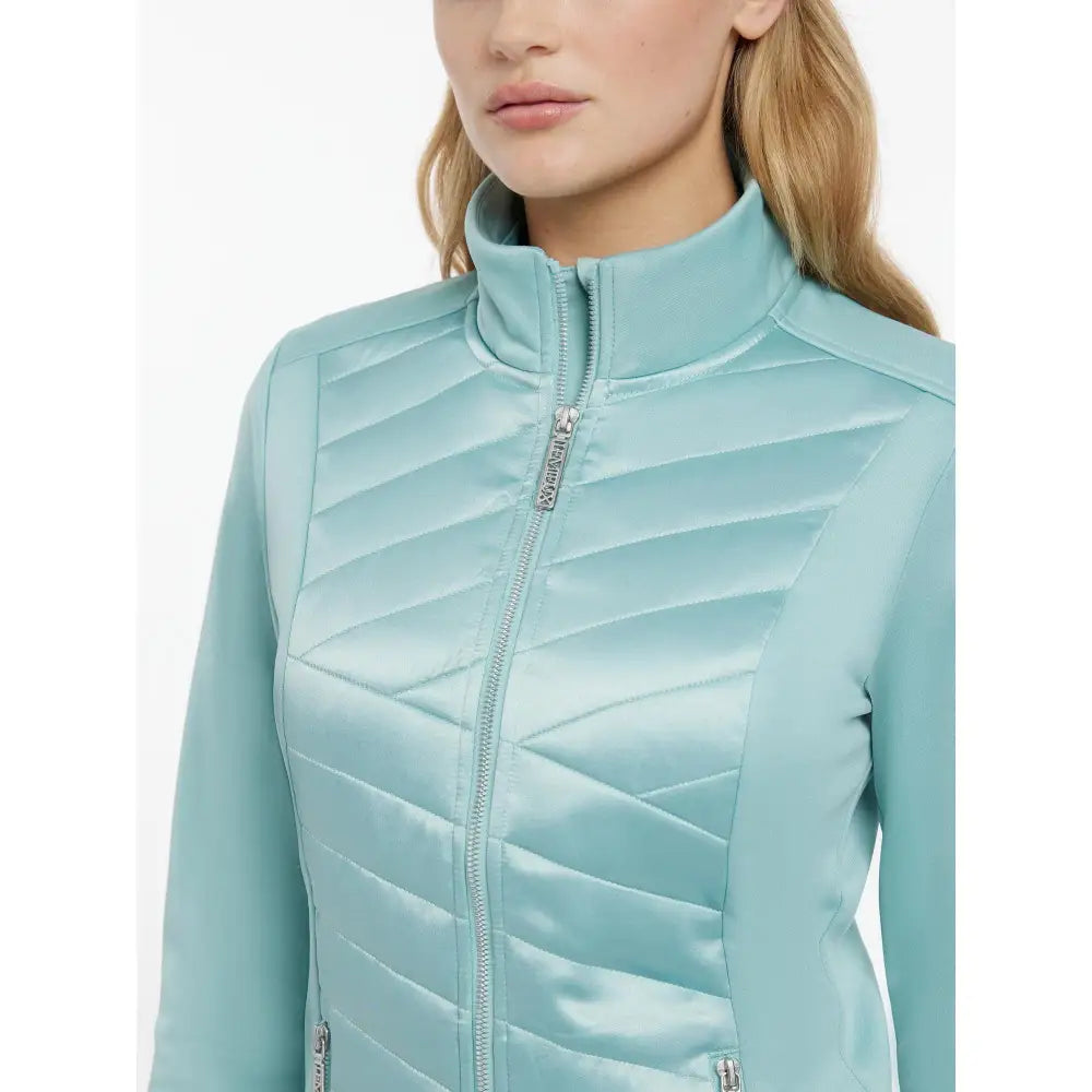 A light blue quilted zip-up lemieux dynamique jacket aqua with high collar and silver zippers for stylish warmth