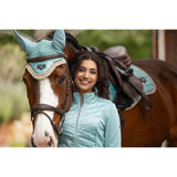 Light blue quilted lemieux dynamique jacket with zipper front and subtle chest logo in dynamique jacket aqua style