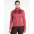 A women’s pink quilted lemieux dynamique jacket with a high collar and zip-up front in dynamic jacket cranberry