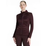 A sleek maroon quilted lemieux dynamique jacket with zip-up front and high collar, perfect for cool weather wear