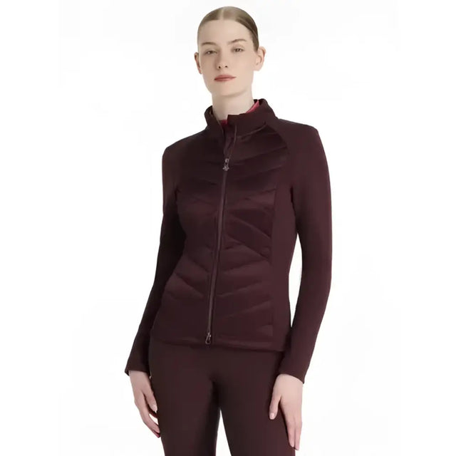 A sleek maroon quilted lemieux dynamique jacket with zip-up front and high collar, perfect for cool weather wear