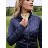 Navy blue quilted lemieux dynamique jacket dusk blue with subtle sheen and embroidered branding on the sleeve