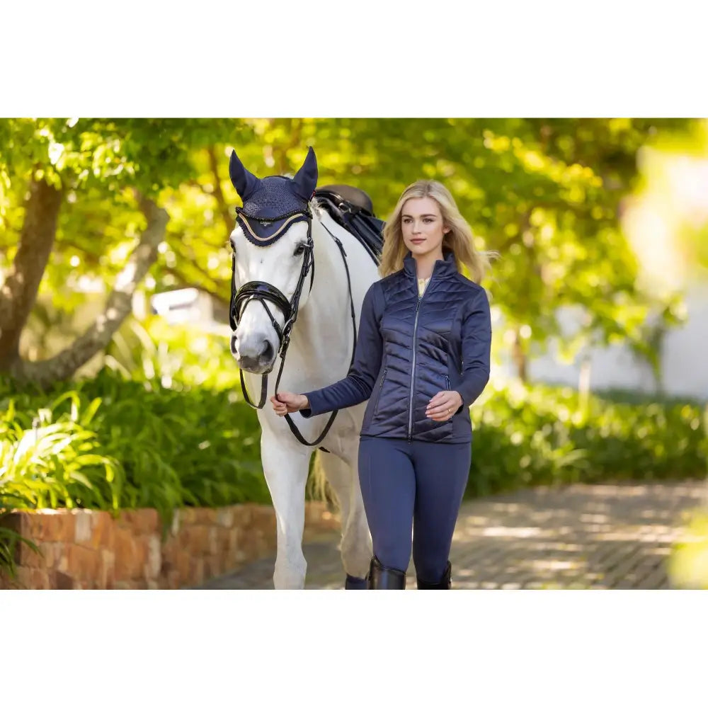 Navy blue quilted lemieux dynamique jacket dusk blue perfect for equestrian use with stylish stitched design