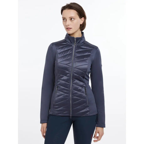 Navy blue quilted lemieux dynamique jacket dusk blue with high collar and zippered pockets for cold weather use
