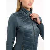 Teal Lemieux Dynamique Jacket Petrol with a high collar on a person with long blonde hair