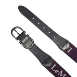 Black leather lemieux elasticated belt aubergine with silver buckle and purple strap featuring white lem embroidery