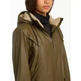 Olive green lemieux elements coat with waterproof hood and plush beige shearling-lined collar for cold weather