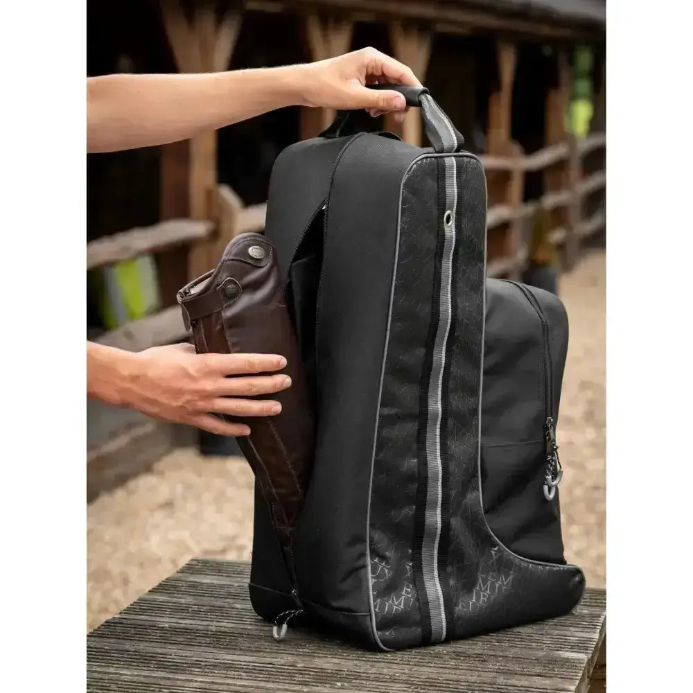 Lemieux elite pro boot and hat bag black with gray zipper accents and subtle star pattern for equestrian use