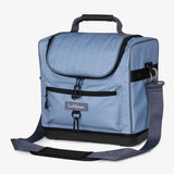 Light blue quilted lemieux elite pro grooming bag powder blue with black trim and adjustable shoulder strap for grooming essentials