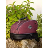 Maroon and black lemieux elite pro hat box with textured fabric, reinforced zipper, and sturdy handle for easy carrying