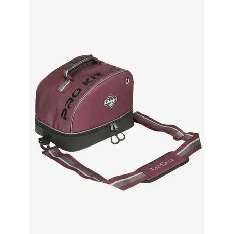 Back view of maroon and black lemieux elite pro hat box saddlebag with reflective stripes on strap for easy visibility
