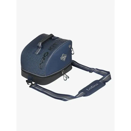 Navy blue lemieux elite pro riding hat bag with textured surface and black trim perfect for pro riding hat navy use