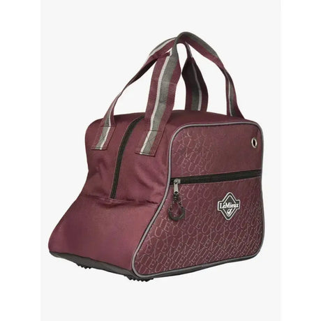 Maroon lemieux elite pro short boot bag with subtle letter pattern and gray striped handles for easy carrying