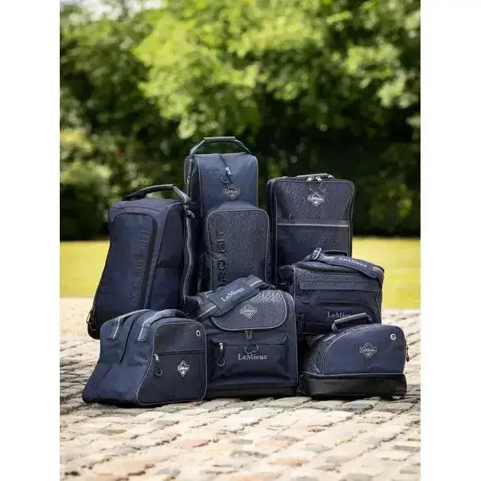 Navy blue lemieux elite wellington boot bag navy with textured fabric and embroidered logos for equestrian use