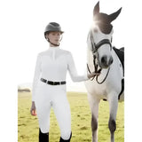 White lemieux emily long sleeve shirt with black belt and matching helmet perfect for equestrian shows