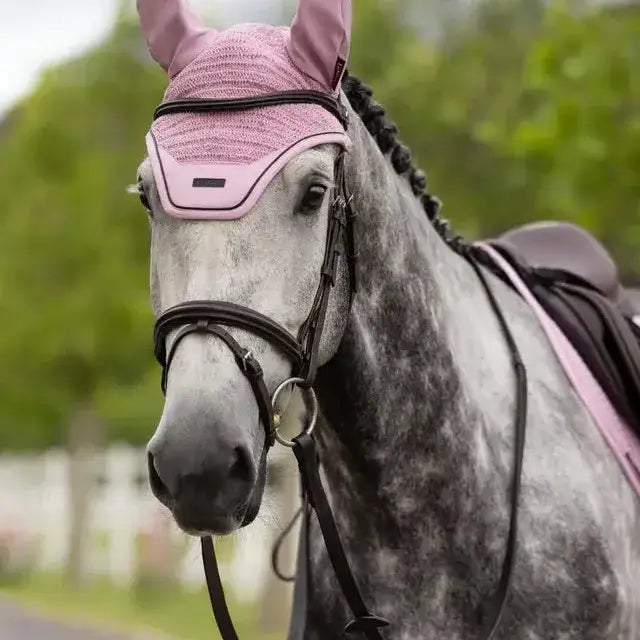 Pink woven lemieux essence acoustic fly hood fondant with ear flaps and black trim for horse protection