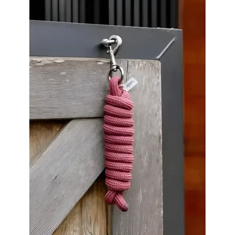 A pink braided rope keychain with silver hook and clasp from lemieux essence leadrope rosewood collection