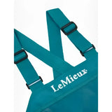 Teal fabric lemieux eventing bib with black plastic buckles and white embroidered lemieux branding in peacock color