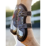 Black and silver lemieux exo-flex expert tendon boot with mesh panel and adjustable straps showing lambs brand name