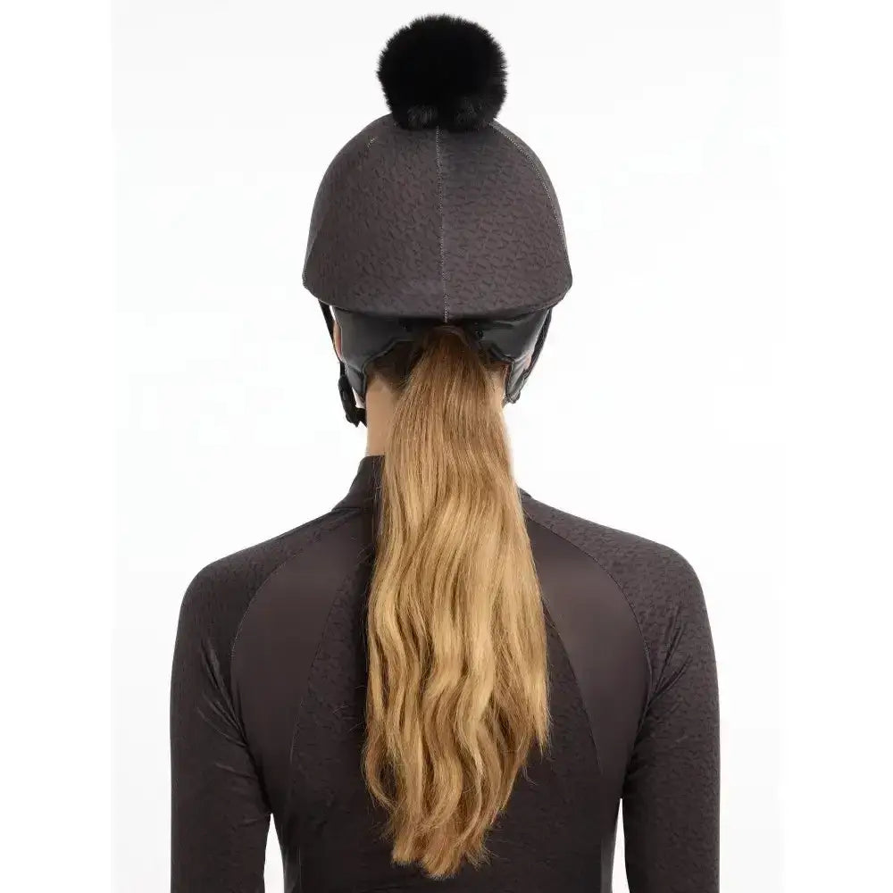 Dark gray lemieux faith hat silk cinder equestrian helmet with black faux fur pom-pom on top