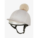 Equestrian helmet adorned with Lemieux Faith Hat Silk Stone decorative knit cover