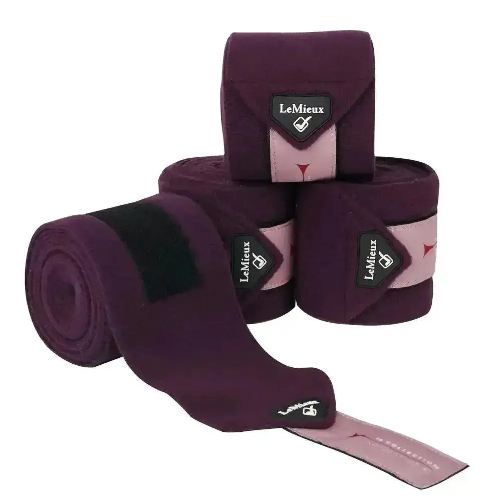 Purple lemieux fig classic polo bandages set of 4 with pink and black accents luxury lemieux fleece wraps