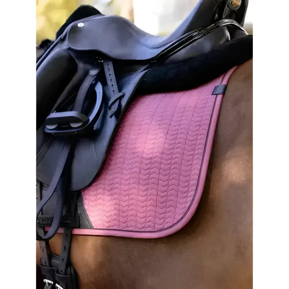 Pink quilted lemieux finesse dressage square rosewood saddle pad with faux leather and chevron pattern
