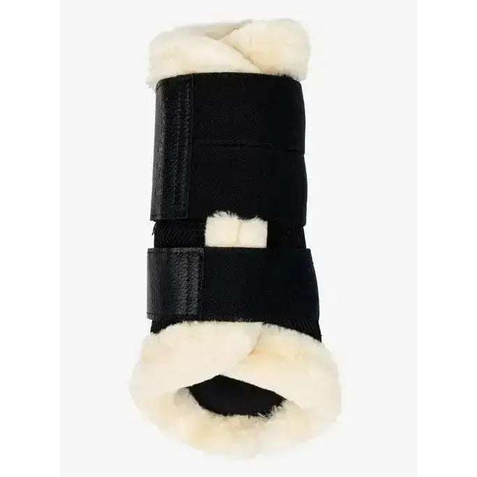 Black horse hoof boot with cream fleece lining and velcro straps lemieux fleece edged mesh brushing boots