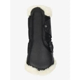 Black leather lemieux fleece edged mesh brushing boots with white shearling lining and adjustable strap closure