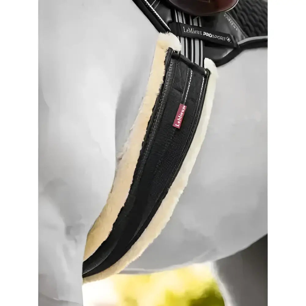 Black leather lemieux fleece lined anatomic girth black natural with cream fleece lining and red brand tag