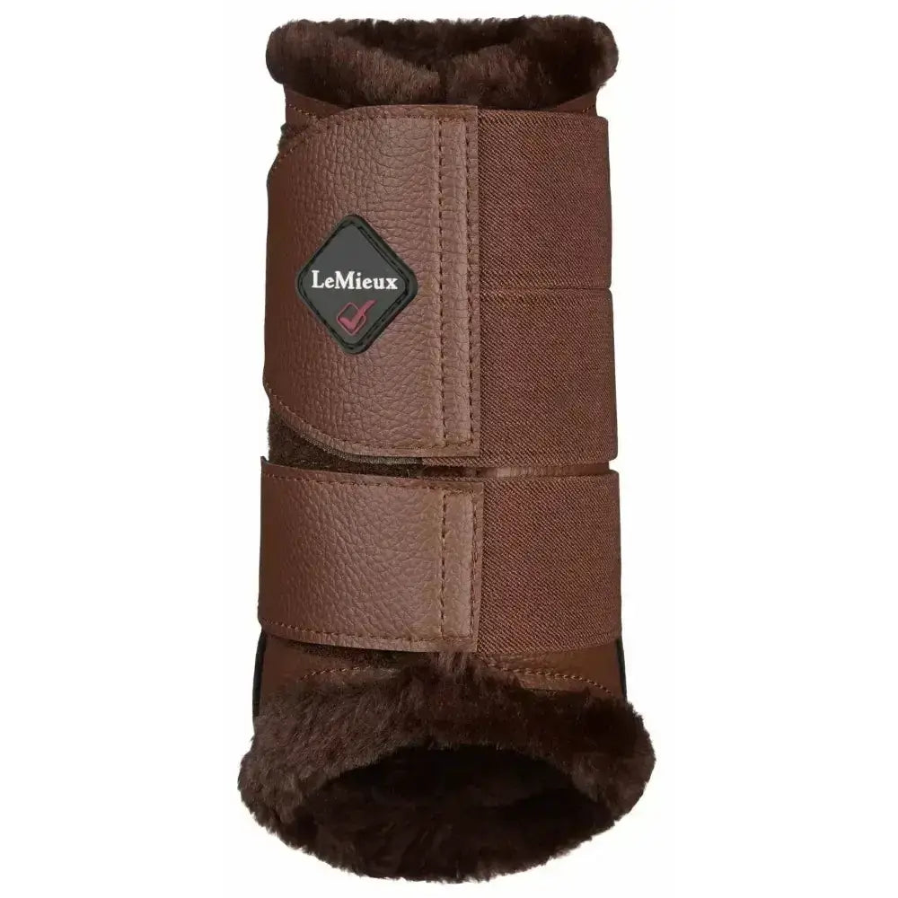 Brown leather lemieux fleece lined brushing boots with plush fur lining and brand patch for a beautiful fit