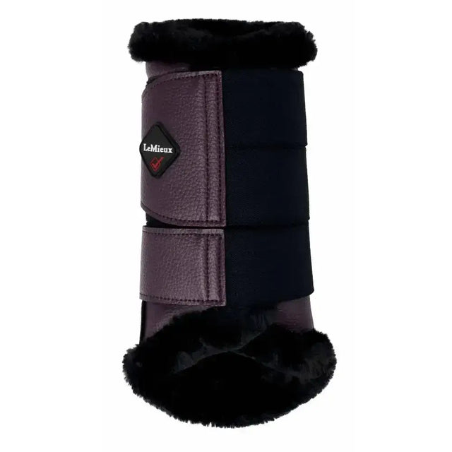 Black and dark purple lemieux fleece lined brushing boots fig with plush black fur trim and brand logo on the side