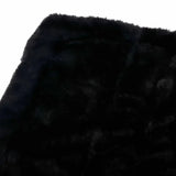 Black faux fur blanket with plush texture shown with lemieux fleece lined brushing boots fig fleece lined brushing boots