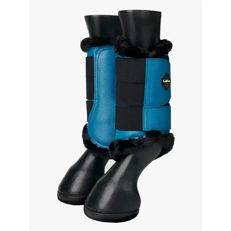 Lemieux fleece lined marine brushing boots in blue and black with plush fur trim for comfortable leg protection