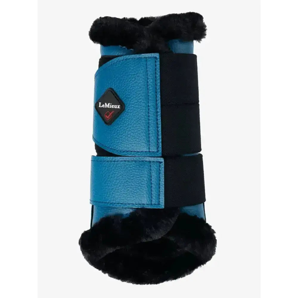 Blue leather lemieux fleece lined brushing boots with marine color and black faux fur trim for comfortable fit