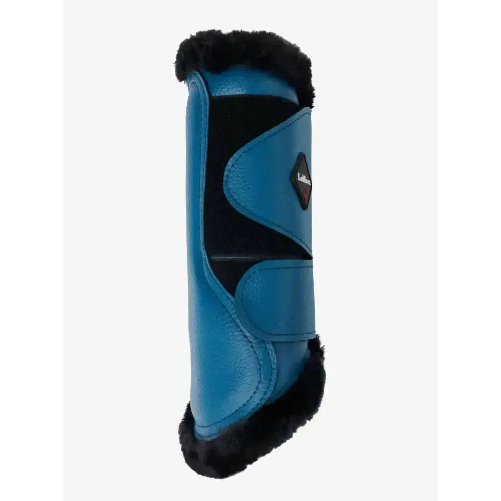 Blue leather lemieux fleece lined marine brushing boots with black faux fur trim and diamond brand logo