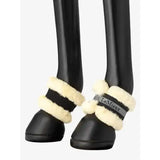 Black lemieux fleece pastern wrap with cream fleece trim and branded strap lightweight lemieux fleece design