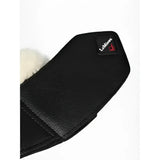 Black textured faux leather lemieux fleece wrapround overreach boots with white fur lining and small lemieux logo patch