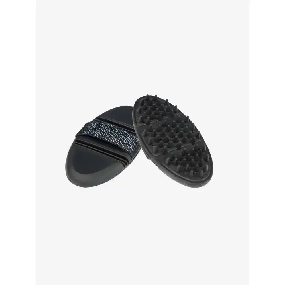 Black rubber lemieux flexi massage brush with textured grip and flexible bristles for gentle grooming