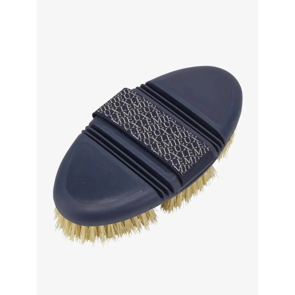 Navy lemieux flexi scrubbing brush with light brown bristles and repeating lemieux logo on handle strap