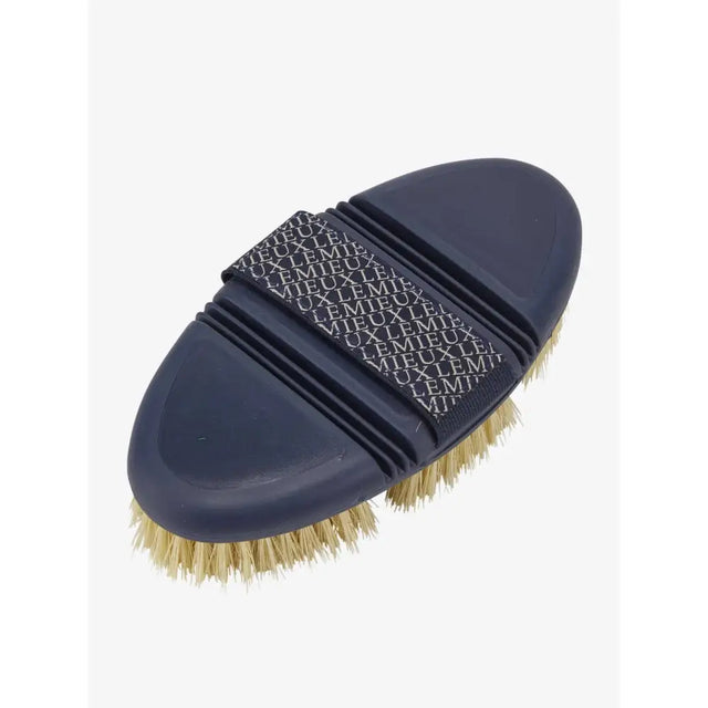Navy lemieux flexi scrubbing brush with light brown bristles and repeating lemieux logo on handle strap