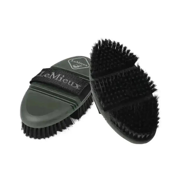Dark green lemieux flexi soft body brush with black bristles and strap for gentle grooming of horses