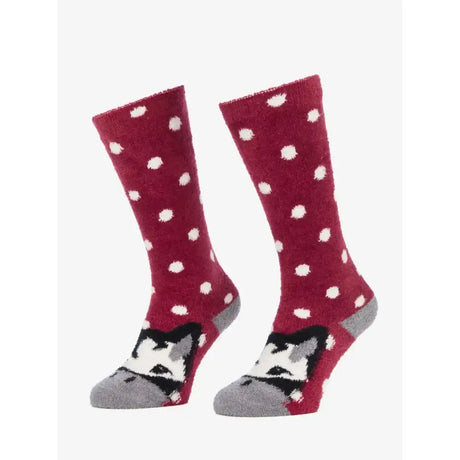 Maroon lemieux fluffy character razzle socks with white polka dots and black and white cat design at the toe