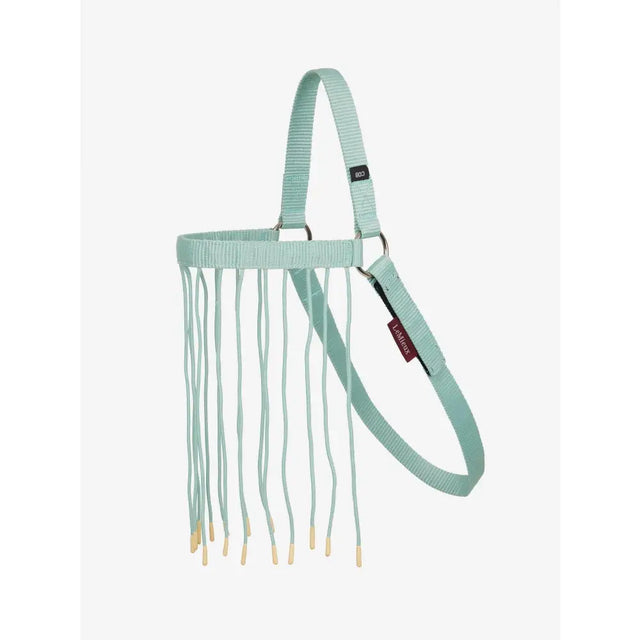 A mint green lemieux fly fringe aqua horse halter with ribbed fabric strap and beige tipped tassels
