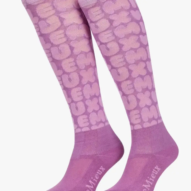 Purple lemieux footsie socks with bubble font fondant luxe pattern and brand name on the foot