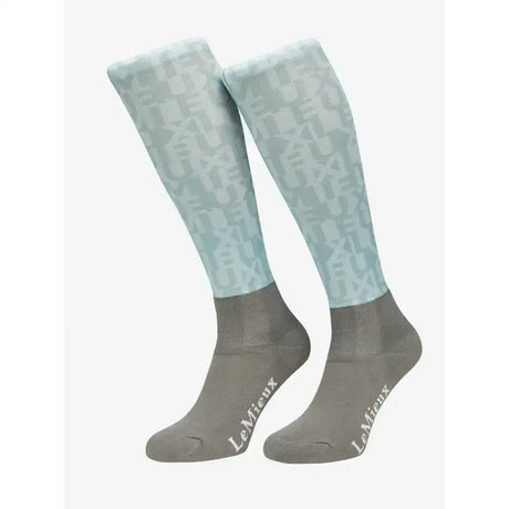 Light blue and gray lemieux footsie socks casey glacier with subtle geometric pattern and funky style embroidery on foot